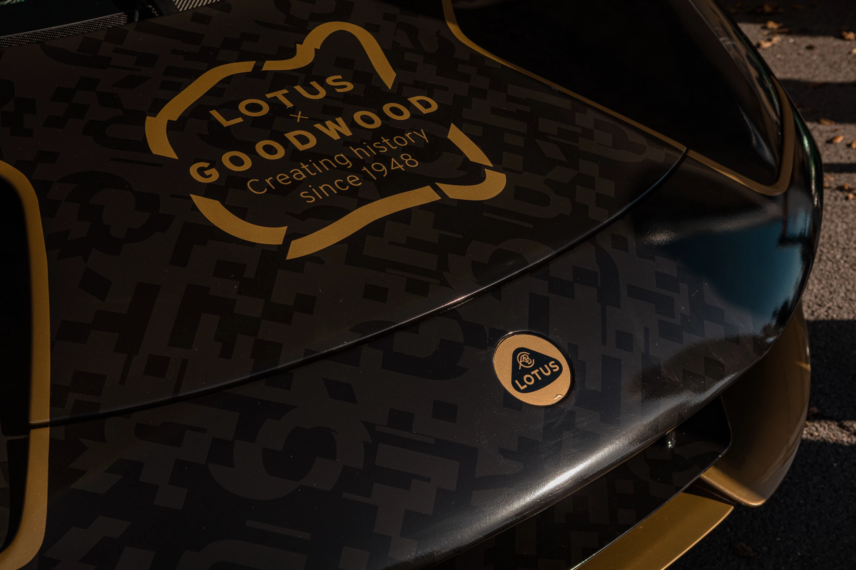 This tribute on the hood of the Goodwood-appearing Lotus Evija celebrates the first year Lotus appeared at the event