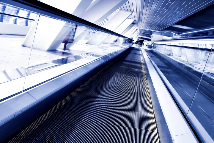 Researchers say that moving walkways in a city the size of Geneva could carry 7,000 passengers an hour