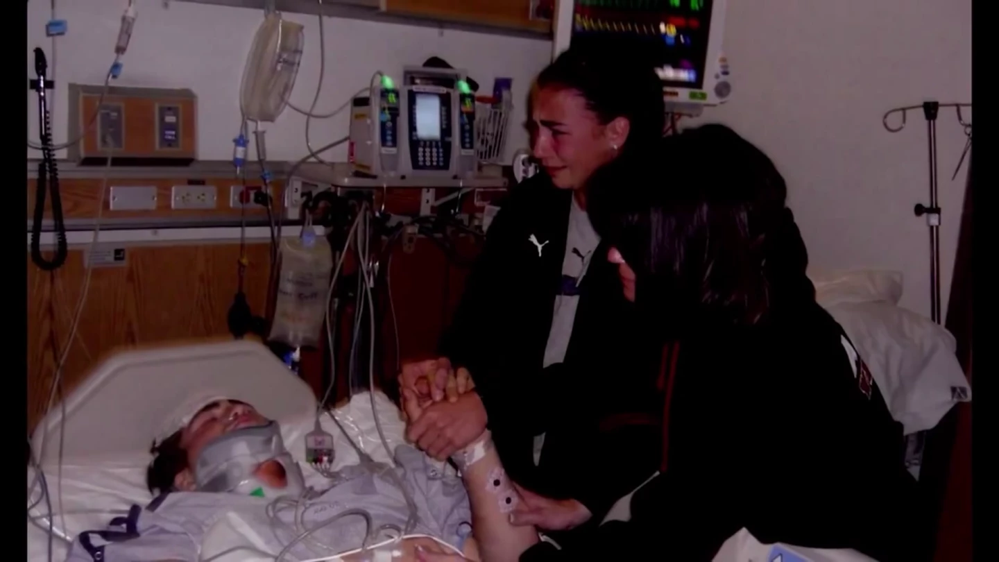 Grief-stricken family members visit Godfrey in hospital after the accident