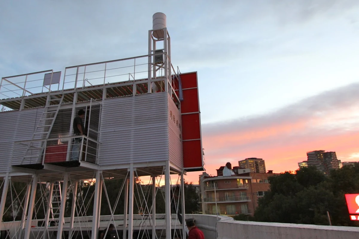 The Billboard House is a simple home built onto the back of a billboard in Mexico City to temporarily house an artist while she works on a new hand-painted advertisement