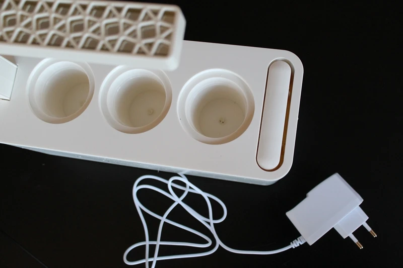 The Smart Herb Garden needs only be plugged into a wall socket and kept topped up with water
