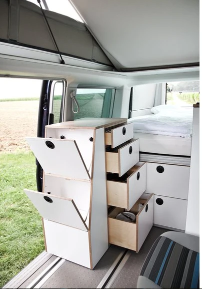 The kitchen area includes plenty of storage space for tools and utensils