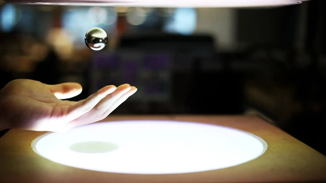 The experimental ZeroN system will hold a magnetic ball in mid-air, wherever the user has left it