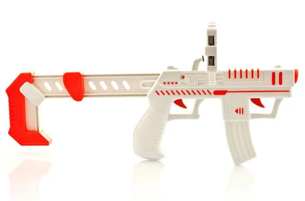 The appBlaster is an iPhone accessory that allows you to shoot at virtual aliens in your real-life surroundings, via the Alien Attack augmented reality app (Photo: RED5)