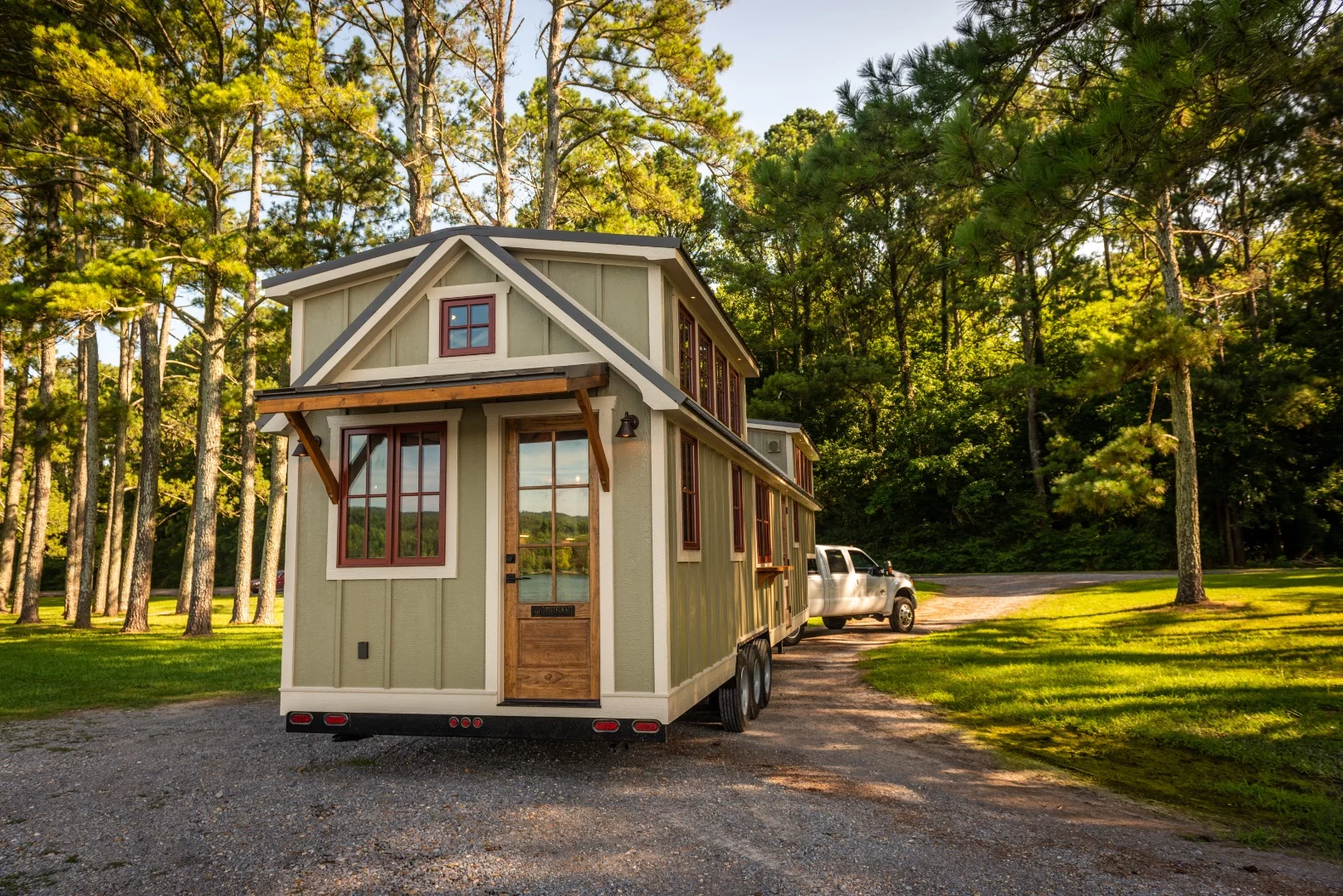 The Denali XL features board and batten siding, a seam metal roof, and two doors