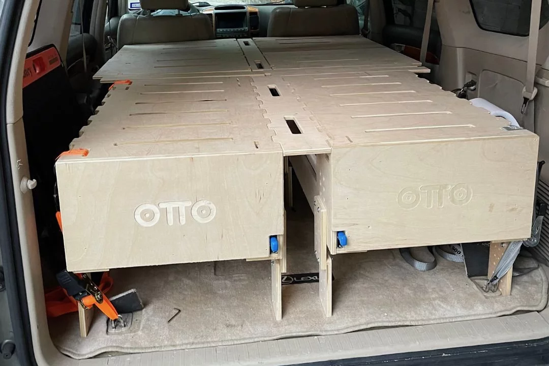 The Otto Nest is secured to the inside of the vehicle via ratchet straps