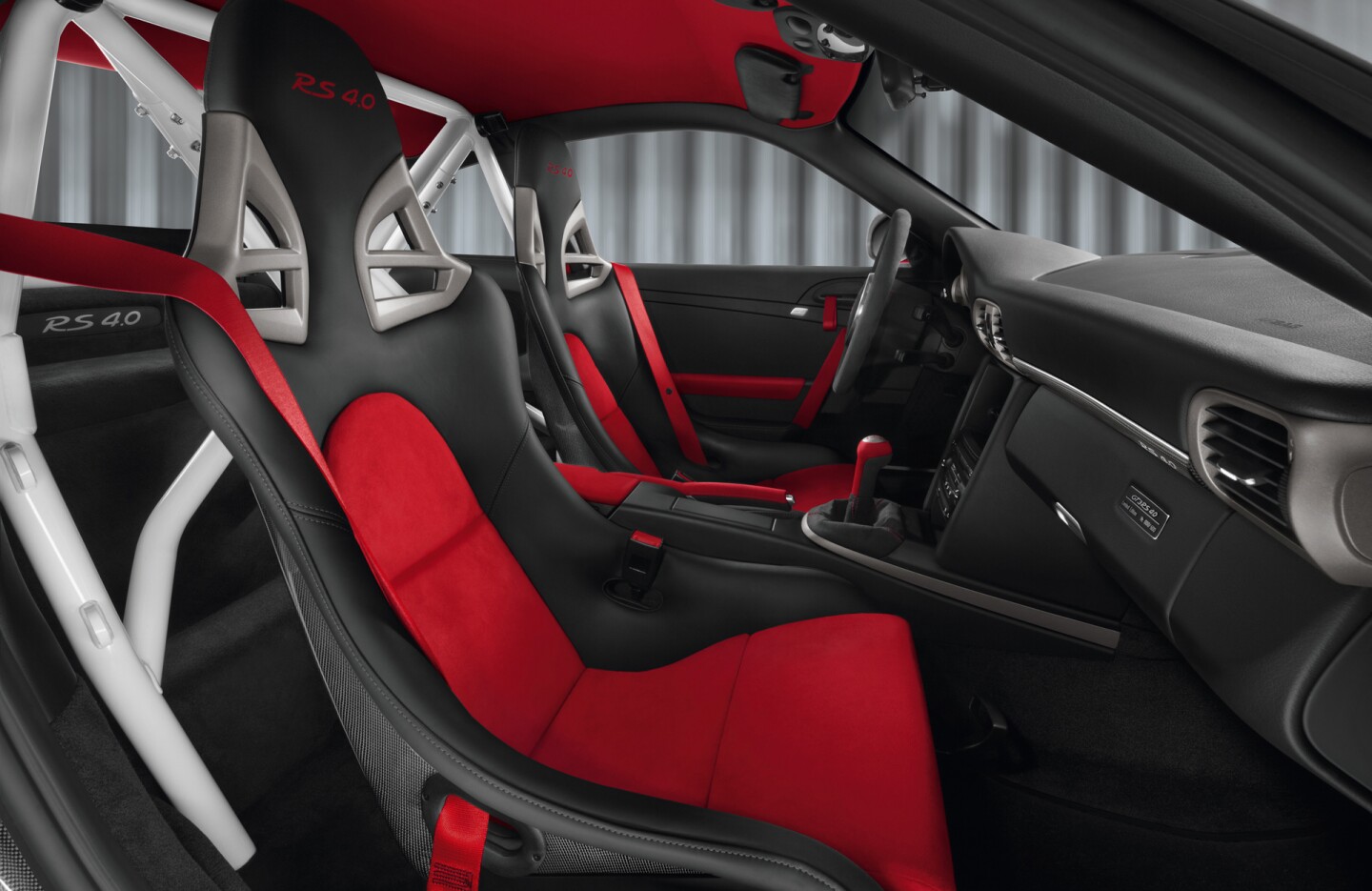Internally, the Porsche 911 GT3 RS 4.0 comes ready to race with a half roll cage, seat belt harnesses, fire extinguisher, and a battery cut-off switch.