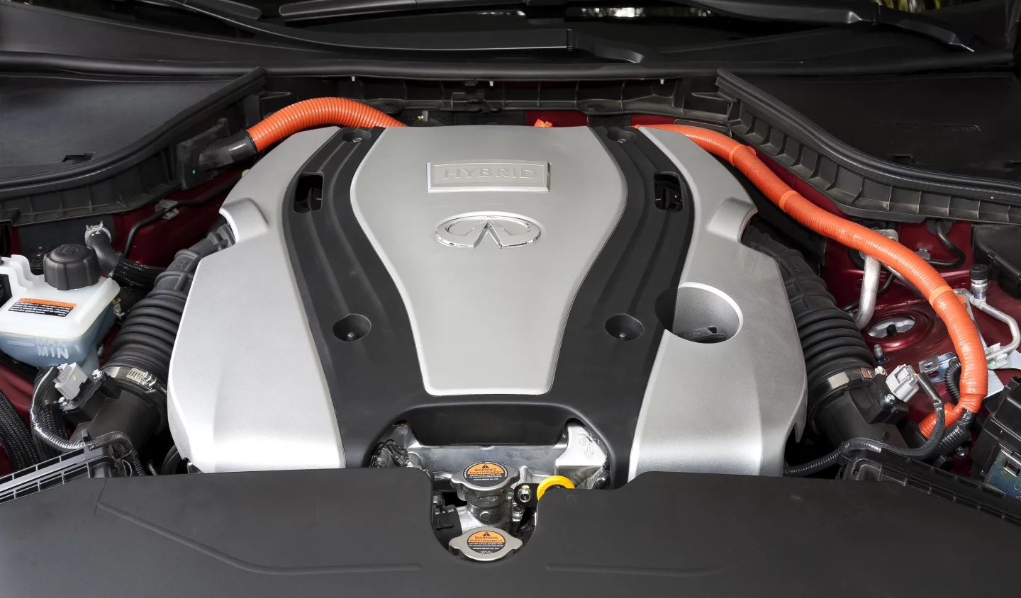 The Q50's naturally aspirated model uses a 3.7 liter V6 capable of delivering 328 hp and 269 lb. ft of torque while the hybrid model delivers a combined power rating of 360 hp