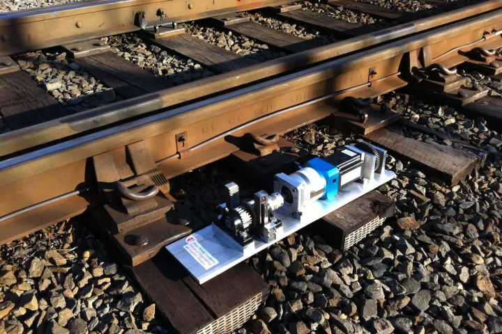 Researchers from Stony Brook University have developed a device capable of harvesting energy from train-induced rail track vibrations to power signal lights, structural monitoring systems or even track switches (Image credit: Lei Zuo)