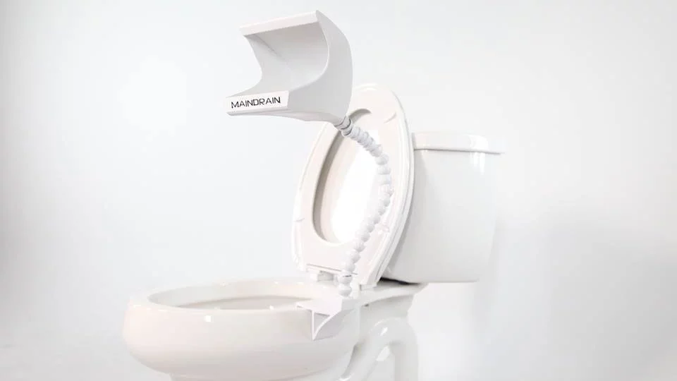 The Main Drain is designed to attach to the rim of an existing toilet